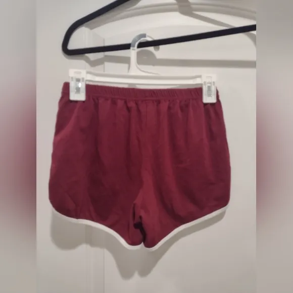 Bundle of silver, red, maroon, and black athletic shorts, all NWOT