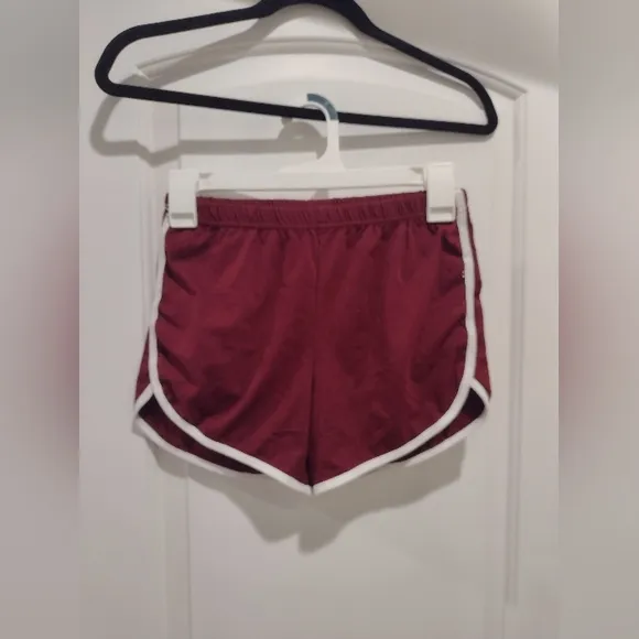 Bundle of silver, red, maroon, and black athletic shorts, all NWOT