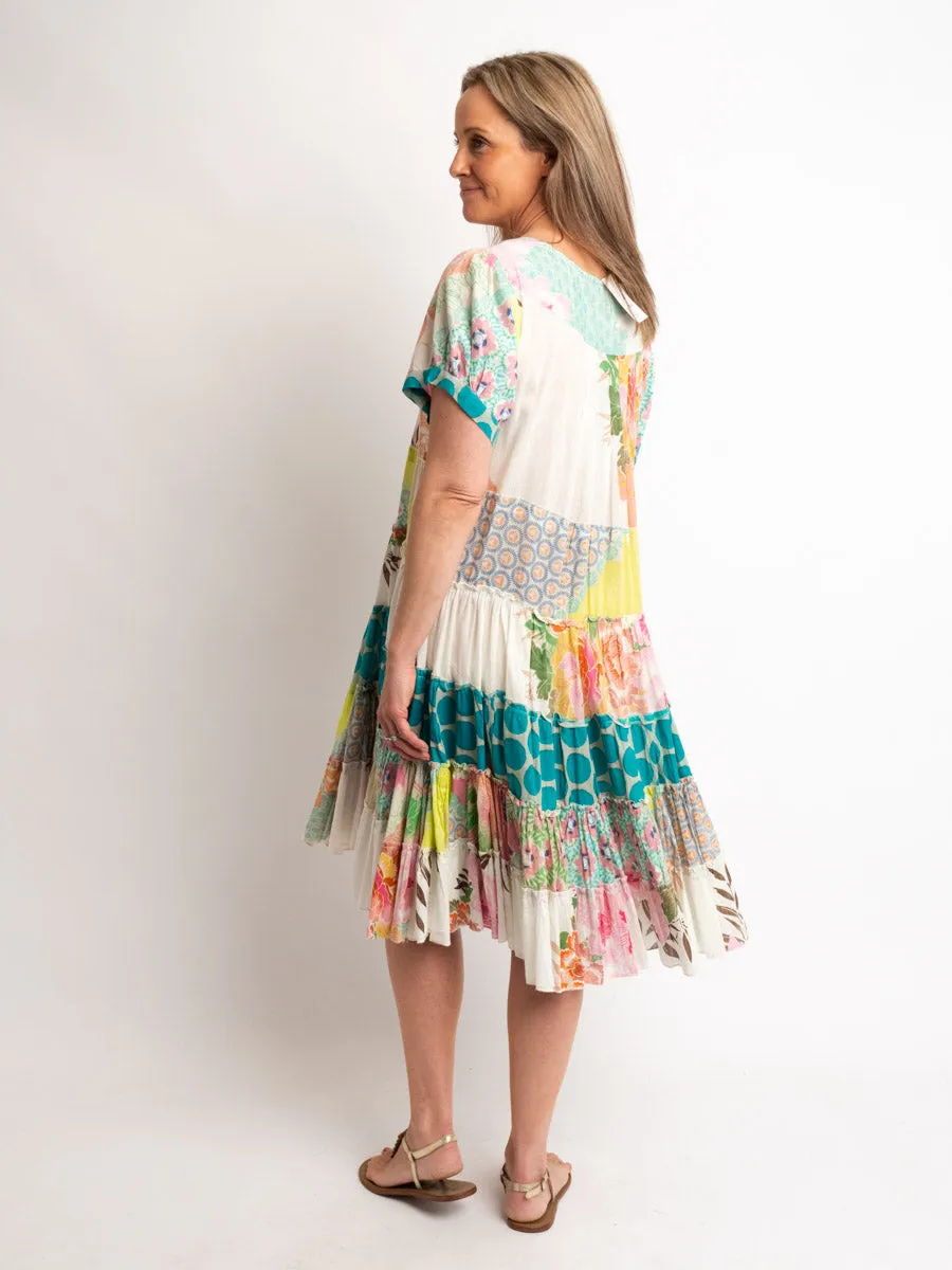 Cap sleeve knee length dress in mixed lime and pink prints