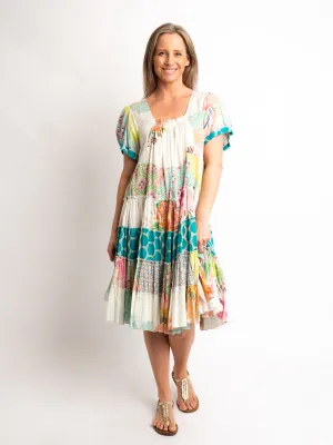 Cap sleeve knee length dress in mixed lime and pink prints