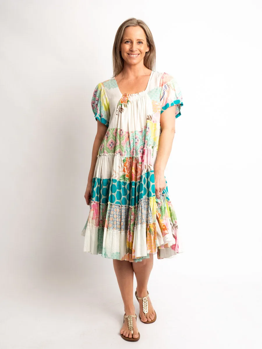 Cap sleeve knee length dress in mixed lime and pink prints