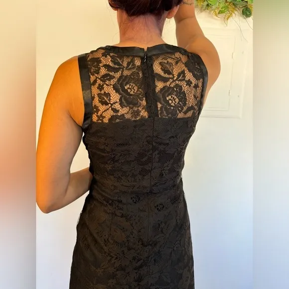 Size 6 Max and Cleo Lace black dress with ruffle detail. Fitted mini dress