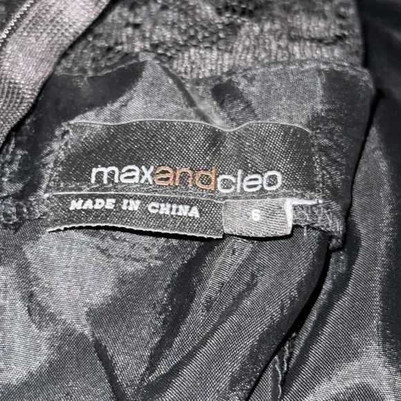 Size 6 Max and Cleo Lace black dress with ruffle detail. Fitted mini dress