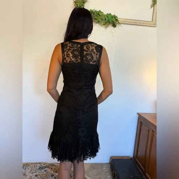 Size 6 Max and Cleo Lace black dress with ruffle detail. Fitted mini dress