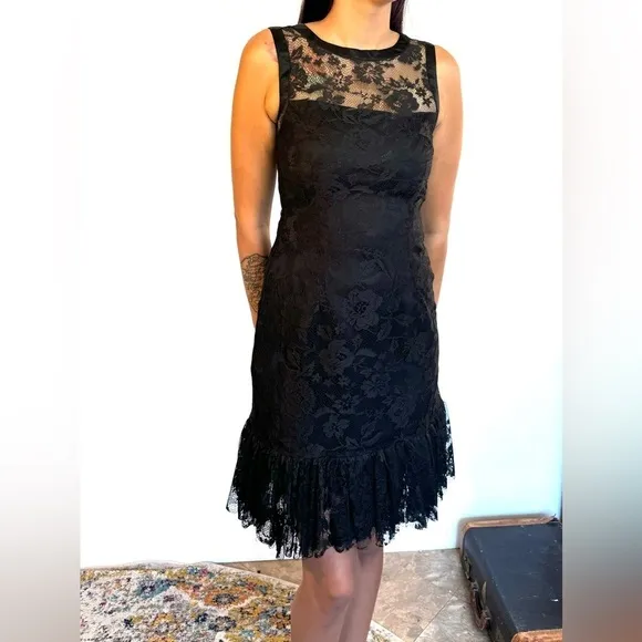 Size 6 Max and Cleo Lace black dress with ruffle detail. Fitted mini dress